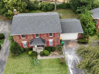 Dark Shingled Roof Installation